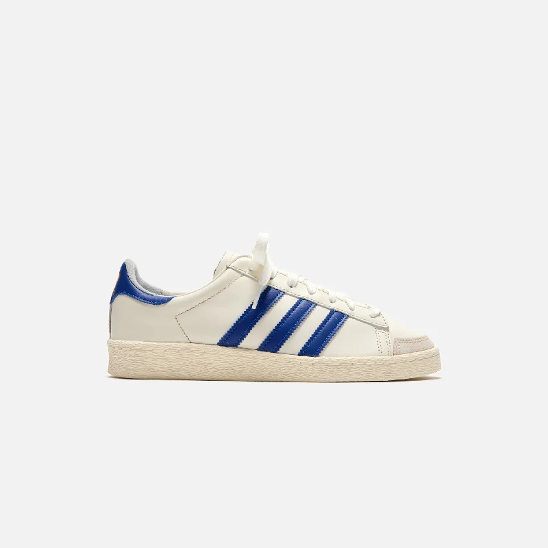 Men's black canvas sneakers with a red soleadidas Jabbar Low - Off White / Collegiate Royal / Cream White