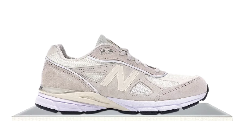 Men's lifestyle sneakers with a premium material constructionNew Balance 990v4 Stussy Cream